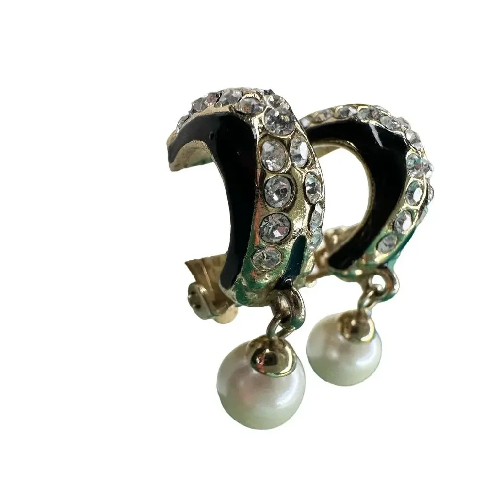 Vintage goldtone, black enamel, rhinestones, and faux pearl clip-on earrings